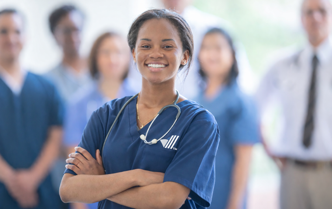 Hemorrhoid specialist in front of other specialists at USA Hemorrhoid Centers.