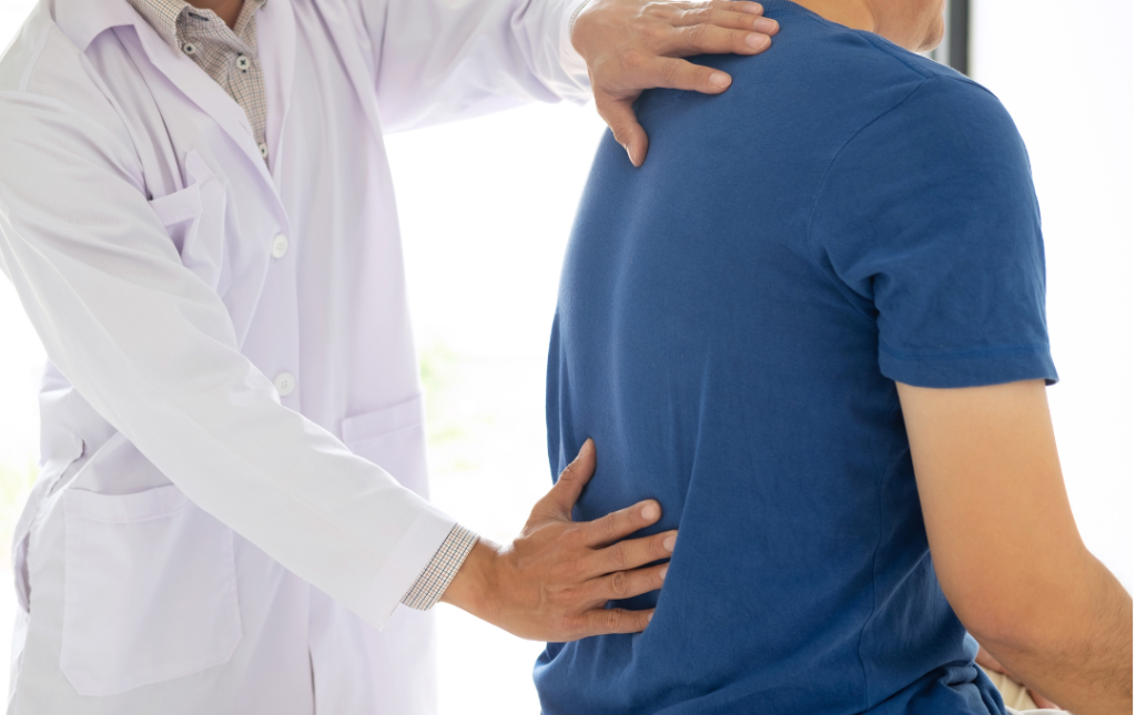 Hemorrhoid specialist performing a physical evaluation to check for hemorrhoids